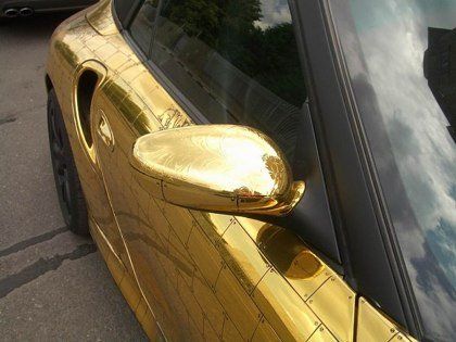 Шик по-русски: Porsche 911, покрытый золотыми пластинами - фото 9